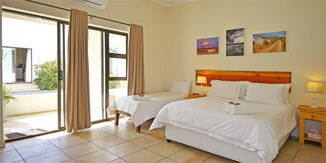 En-suite Room 5 offer twin/King bed of high quality, plus a double bunk bed suitable for kids, plus another single bed by request; sleeping up to five persons.